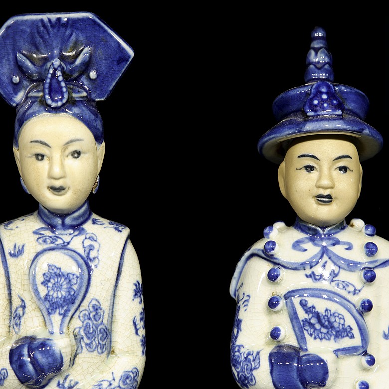 Pair of porcelain civil servants, 20th century