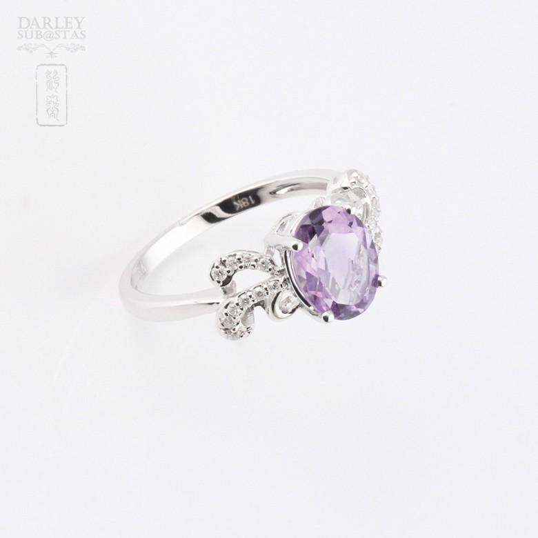 18k white gold ring with amethyst and diamonds.