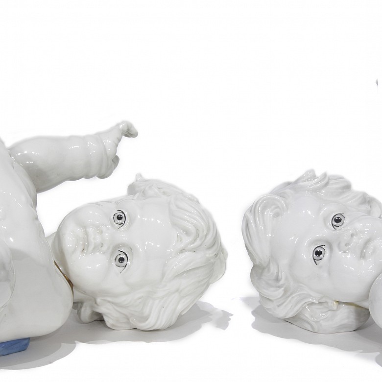 Pair of Algora porcelain angels, 20th century