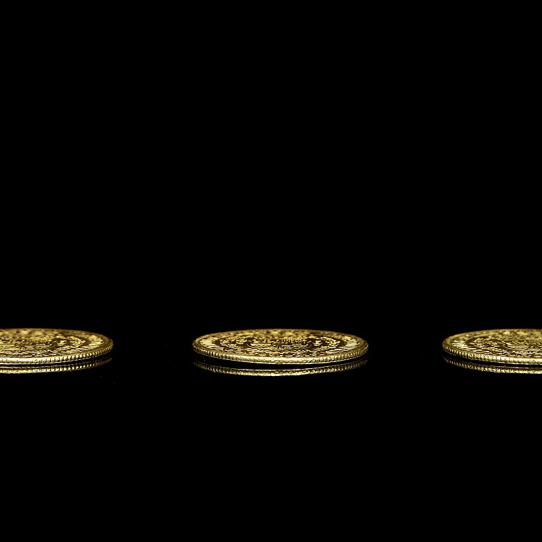 Tres Monedas de oro 