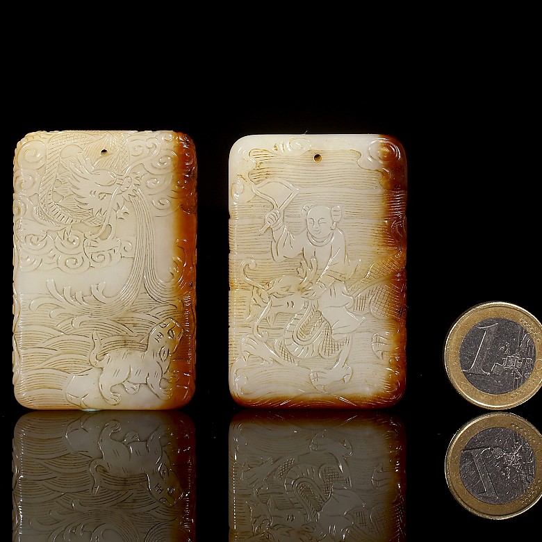 Pair of ‘Dragon and Child’ jade plaques, Qing dynasty