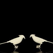 Pair of carved ivory birds, early 20th century.