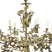 A large chandelier in golden metal, 20th century