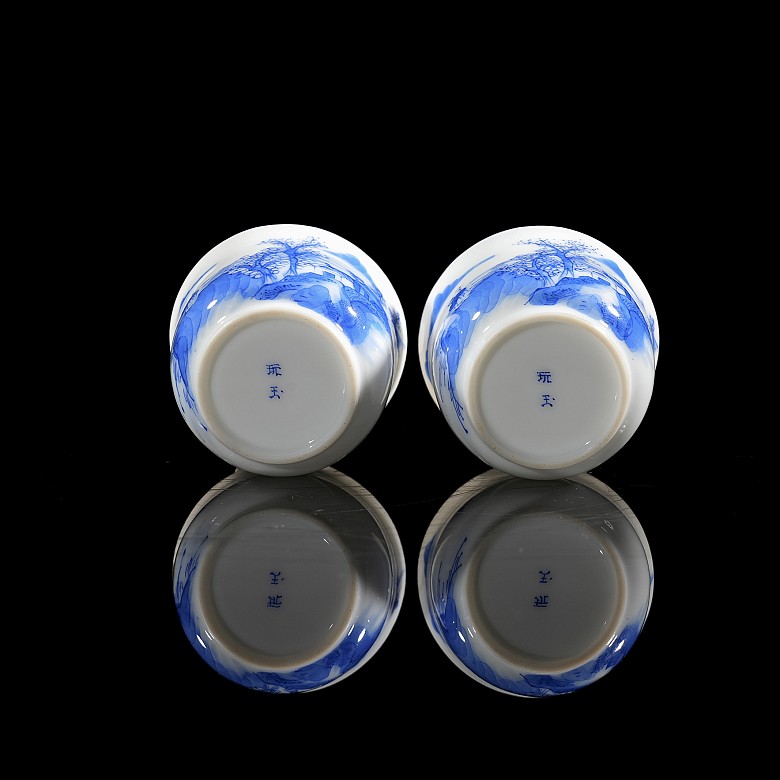 Pair of small porcelain ‘Landscape’ cups, Qing dynasty