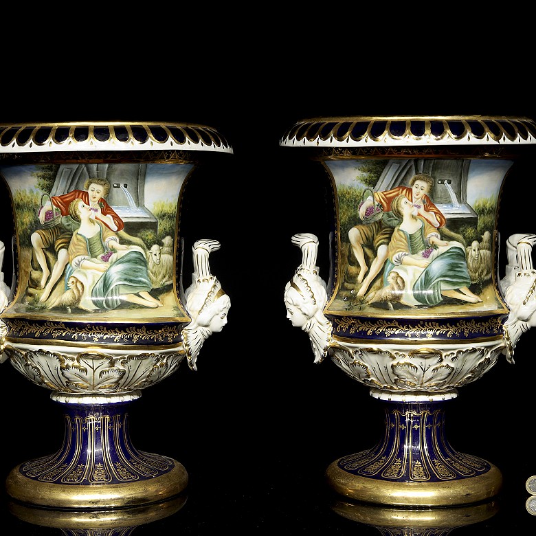 Pair of porcelain enamelled urns ‘Lovers’, 20th century