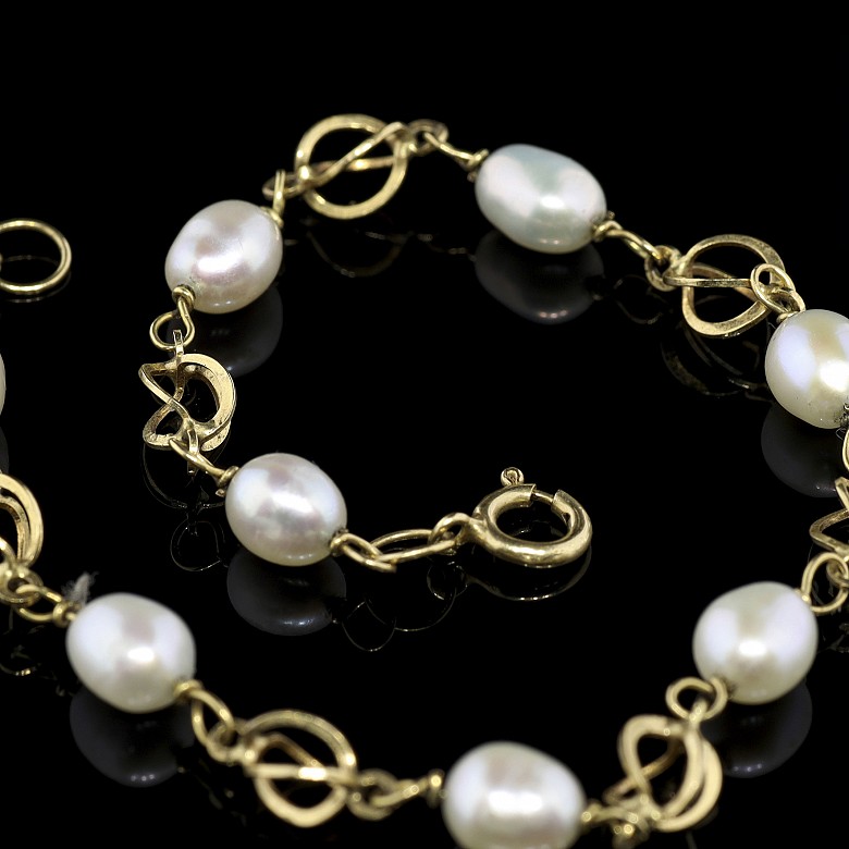 Pulsera de oro amarillo 18 k y perlas