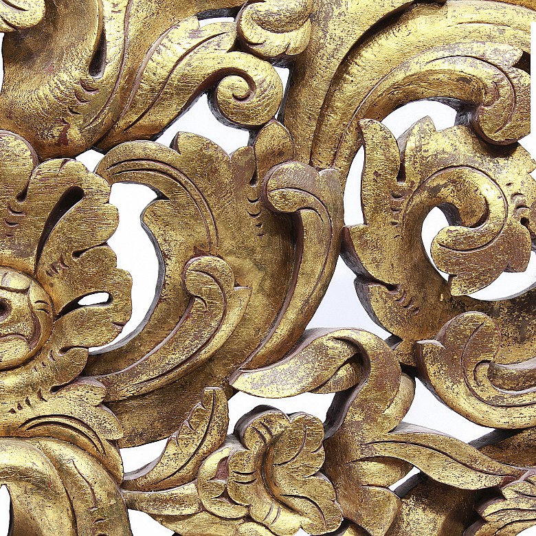 Carved wooden lintel with acanthus scrolls, Bali, Indonesia.