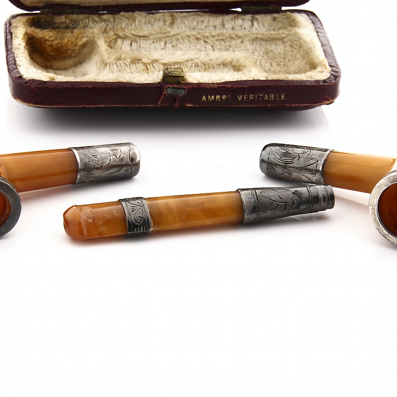 Set of two pipes and a mouthpiece of amber and silver, 19th century