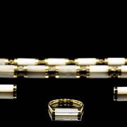 Set of mother-of-pearl necklace, earrings and ring in yellow gold