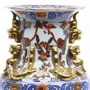 Enameled porcelain vase with golden details, 20th century