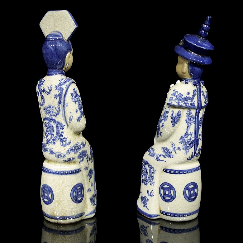 Pair of porcelain civil servants, 20th century