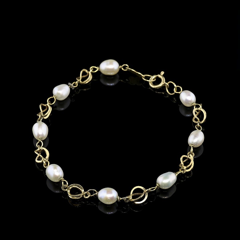 Pulsera de oro amarillo 18 k y perlas