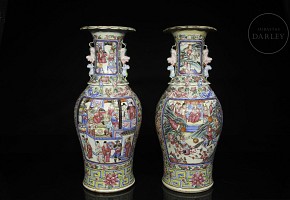 Pair of enamelled vases famille rose “Palace scenes”, Qing dynasty