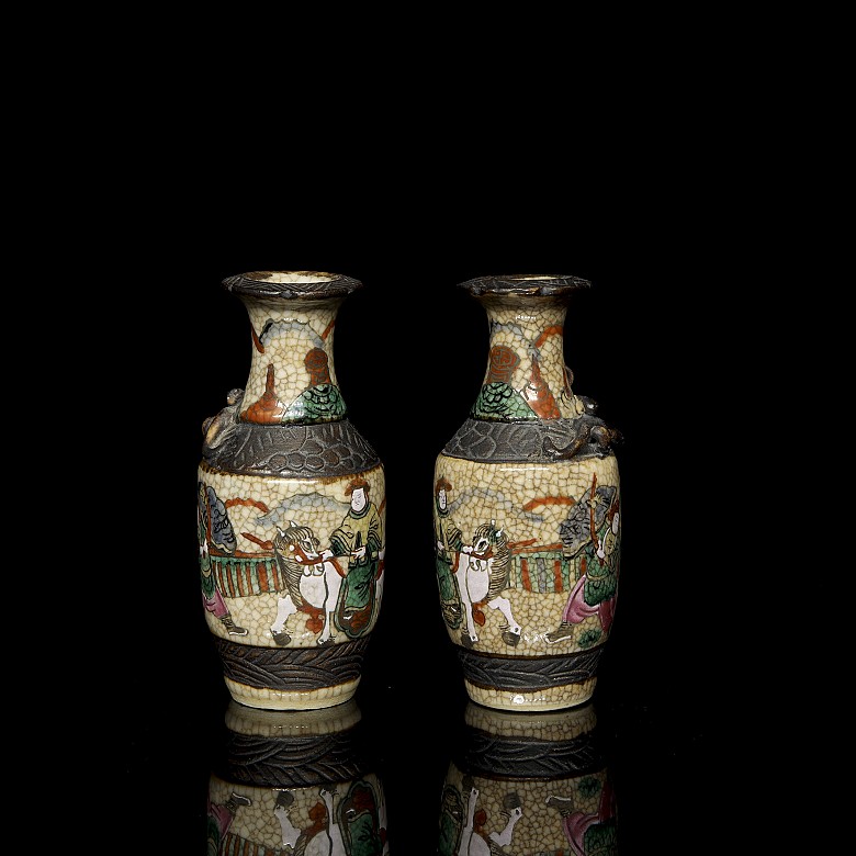 Pair of small Nanking vases, ‘Warriors’, 20th century