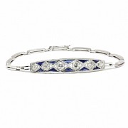 Bracelet with brilliant and sapphire front calibrated in platinum and links in 18k white gold