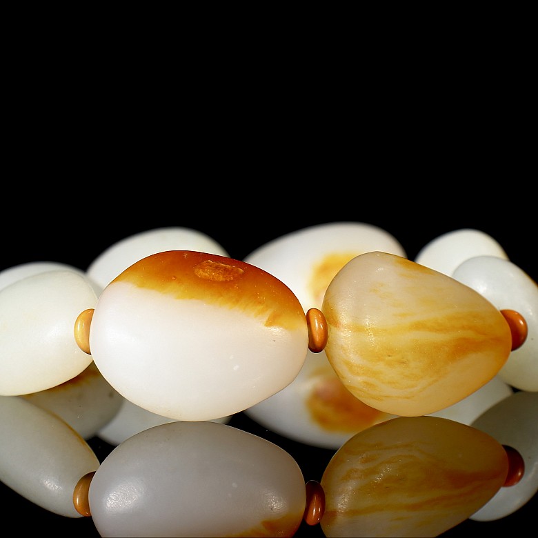 Eight-bead carved white jade bracelet, 20th century