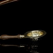 Three silver objects with wooden handles, 20th century