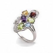 18k gold ring with five color gems and diamonds.