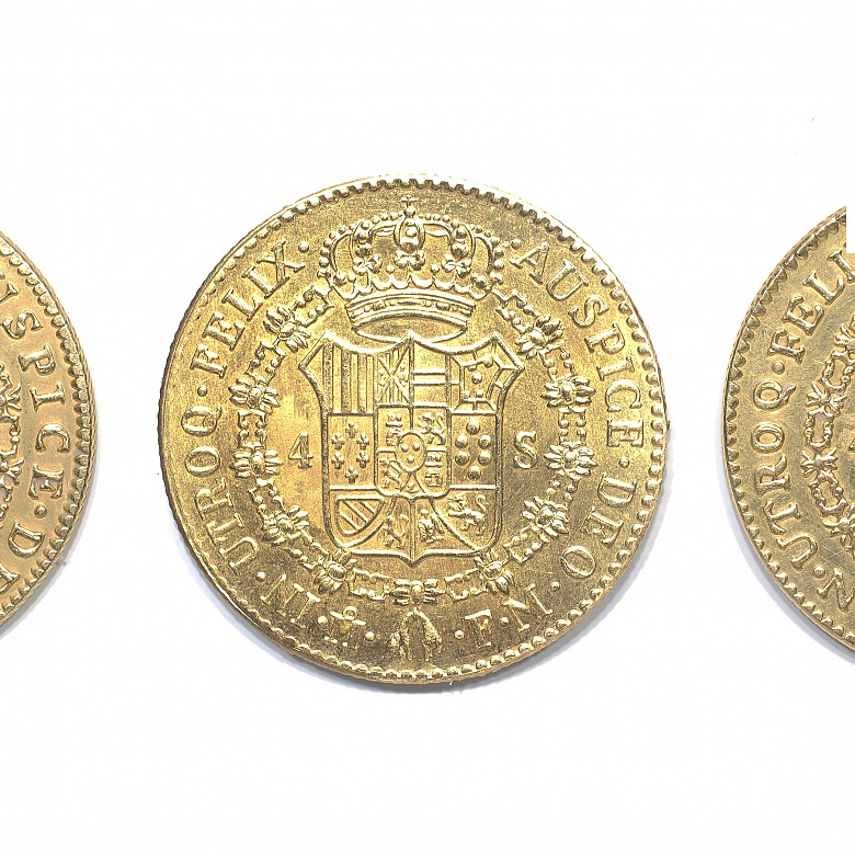 Lote de tres monedas de oro 900 milésimas