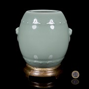 Enamelled porcelain vase with a bronze foot, Qing dynasty