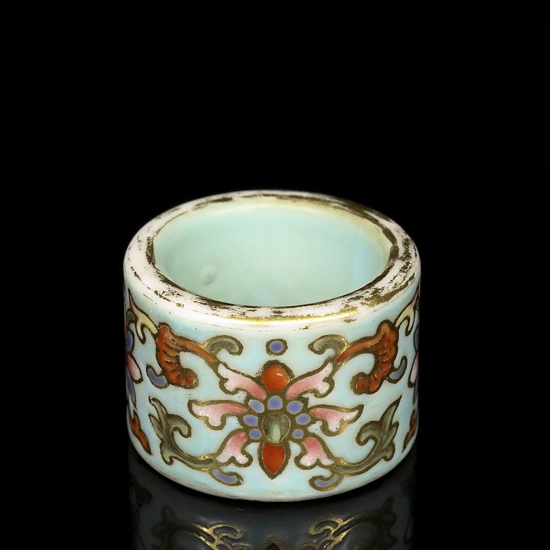 Porcelain enameled archer ring, 20th century