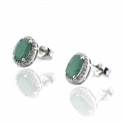 Earrings in 18k gold with diamonds and emeralds