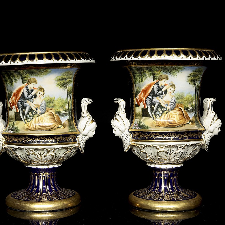 Pair of porcelain enamelled urns ‘Lovers’, 20th century