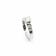 Solitaire diamond ring.