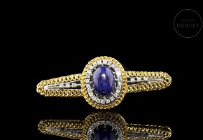 Yellow and white gold brooch with diamonds and lapis lazuli