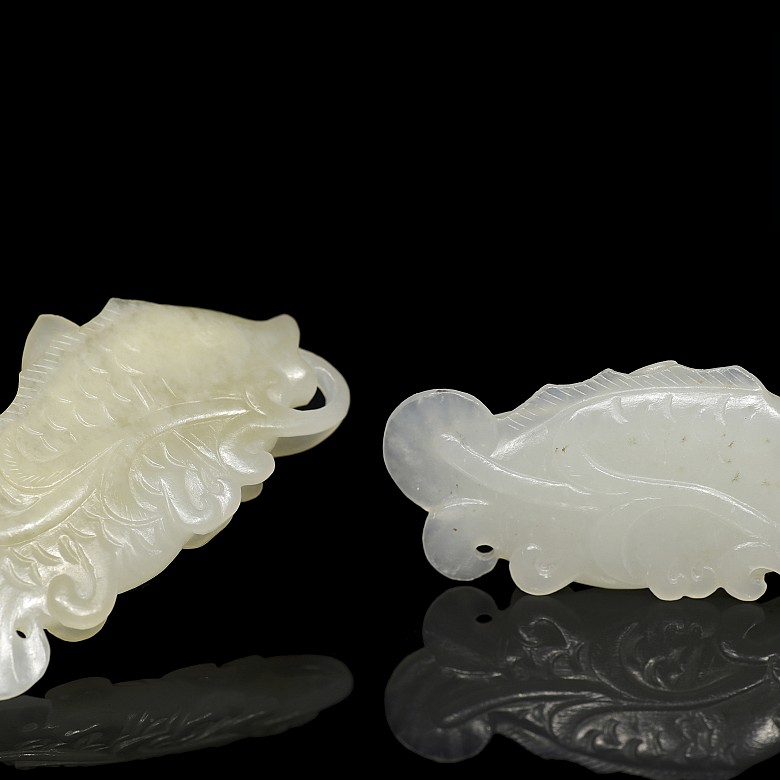 Two white jade fish plaques, 20th century