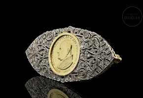 18kt yellow gold brooch with coin