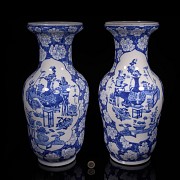 Pair of blue and white ‘Scenes and Plum Blossom’ vases, Qing Dynasty