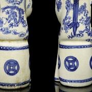 Pair of porcelain civil servants, 20th century