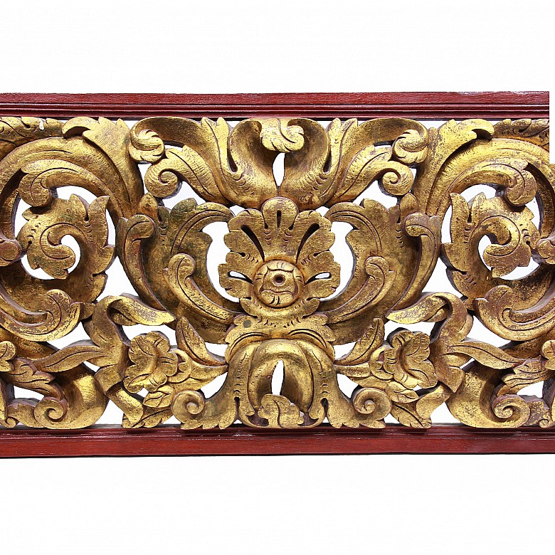 Carved wooden lintel with acanthus scrolls, Bali, Indonesia.