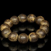 Bracelet of thirteen agar wood beads