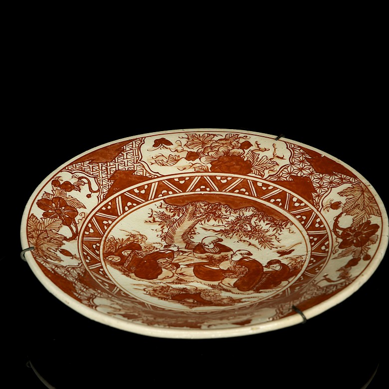 Iron-red enamelled porcelain plate ‘Garden Scene’, with Yongle mark