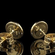 Pendientes dormilona en oro amarillo 18 k con brillante  0,30 ct.