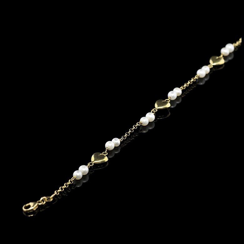 Pulsera de oro amarillo 18 k y perlas