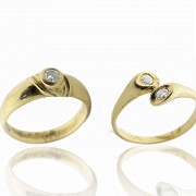 Two 18k gold and diamond rings