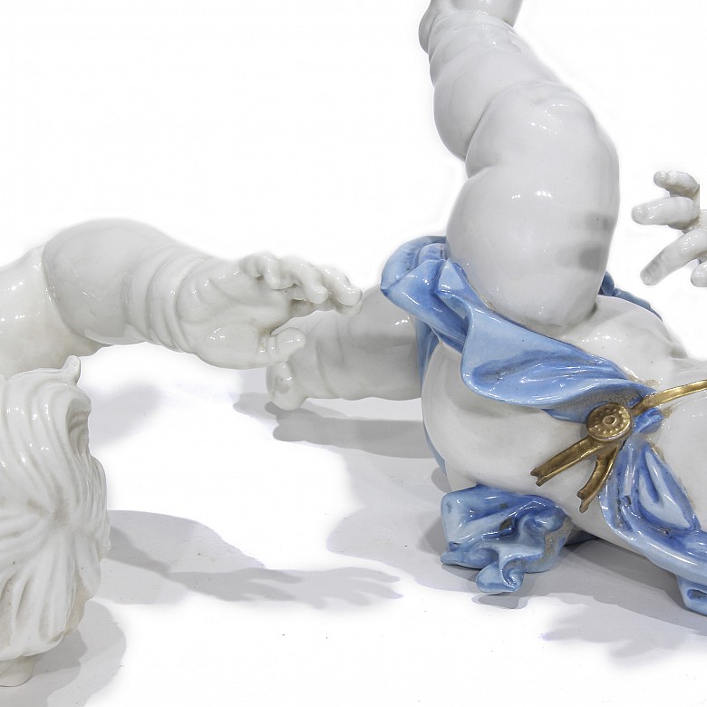 Pair of Algora porcelain angels, 20th century