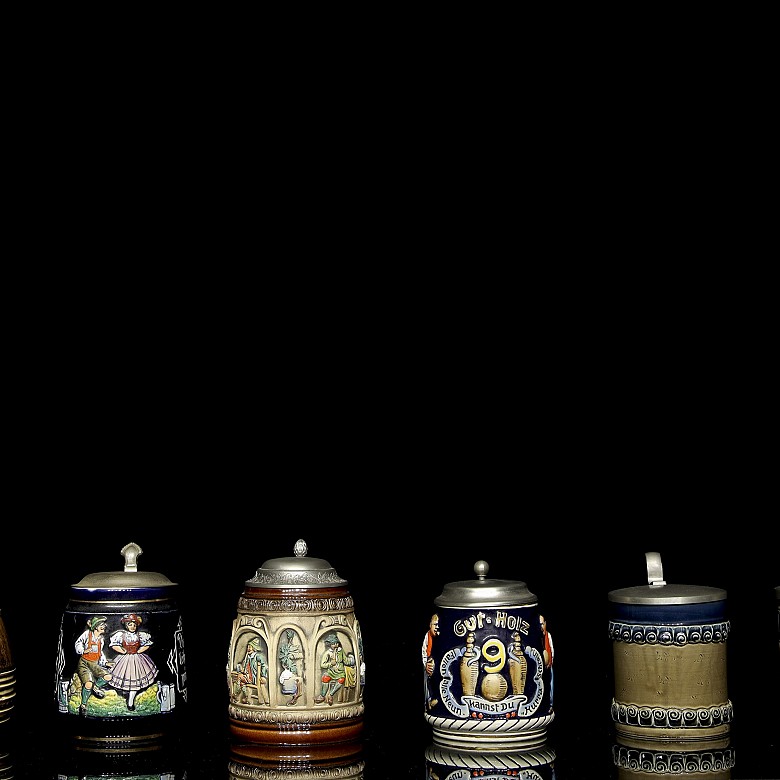 Six glazed ceramic beer steins, 20th century