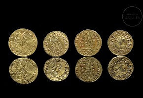 Group of four gold coins