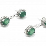 Pair of earrings in 18k white gold, diamonds and emeralds.