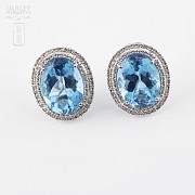 Topaz and diamond earrings in 18k white gold.