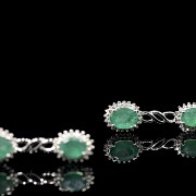 White gold earrings with emeralds and diamonds