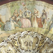 Mother-of-pearl fan with fan holder ‘Society Scene’, 20th century