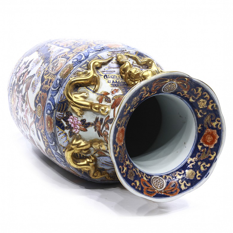 Enameled porcelain vase with golden details, 20th century