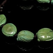 Bracelet with ten carved turquoise beads, Eastern Zhou Dynasty