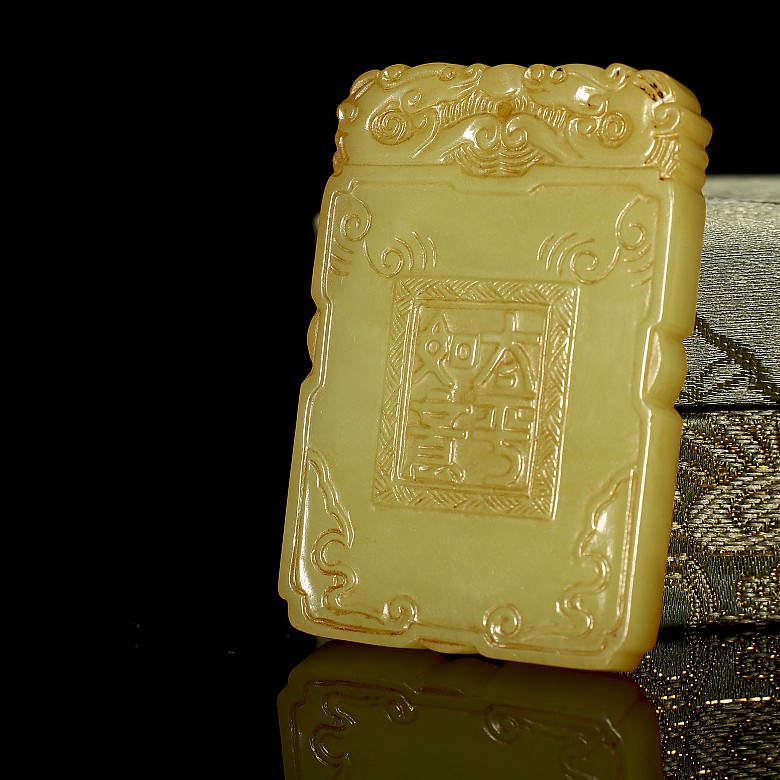 Carved yellow jade ‘Child and Elephant’ plaque, Qing dynasty