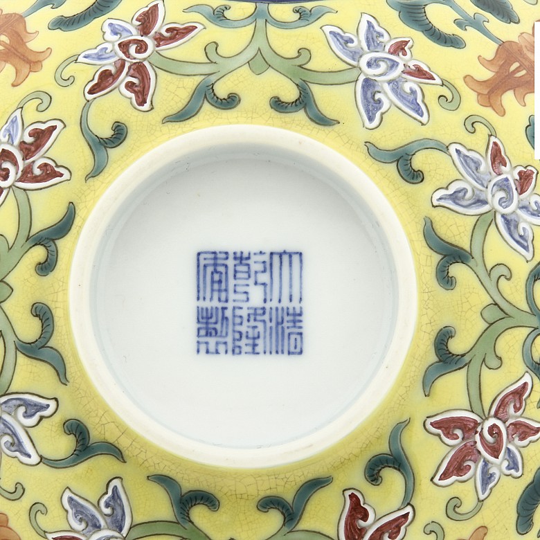 A famille rose yellow-ground bowl, Qianlong seal mark.